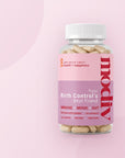 Modiv Your Birth Control's Best Friend — 90 capsule bottle on soft pink